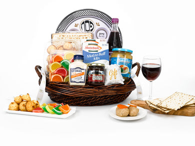 wooden seder gift basket includes kosher grape juice, fruit snacks, matzo ball mix, tand raditional plater 